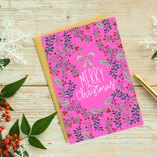 Pink Merry Christmas Greeting Card with Decorative Holly